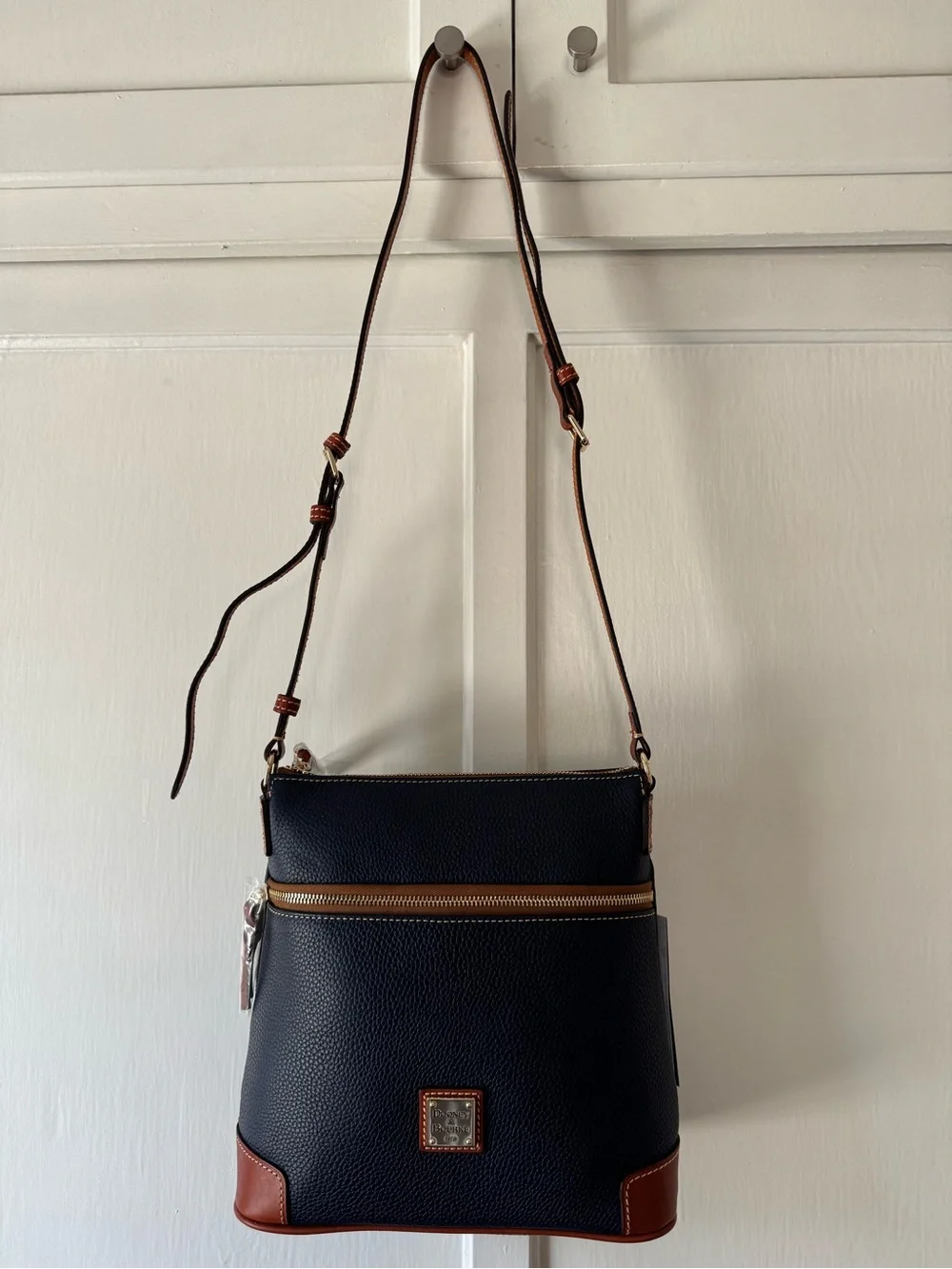 Dooney & Bourke Navy Pebble Leather Crossbody with Brown Trim and Gold Hardware